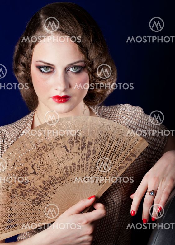 Portrait of young woman with big eyes