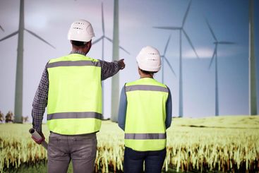 Wind Turbine Engineers At Green Energy Farm
