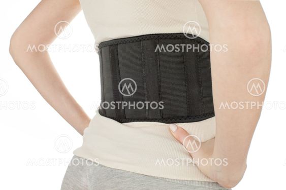 woman wearing back support belt isolated on white