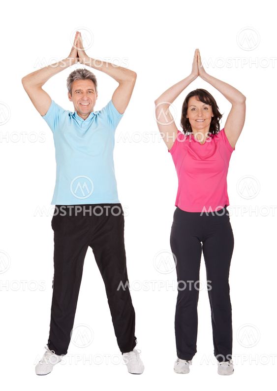 Active mature couple doing fitness