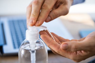 Man On Coronavirus Quarantine Using Disinfection