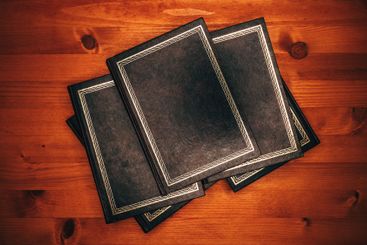 Top view of old vintage hardcover book front cover as...