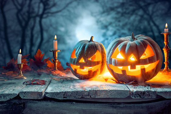 Halloween pumpkins on blue background