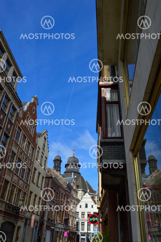 Brussels, Belgium - April 2015: Preserved old European-style residential and commercial buildings on streets of Brussels City, Belgium