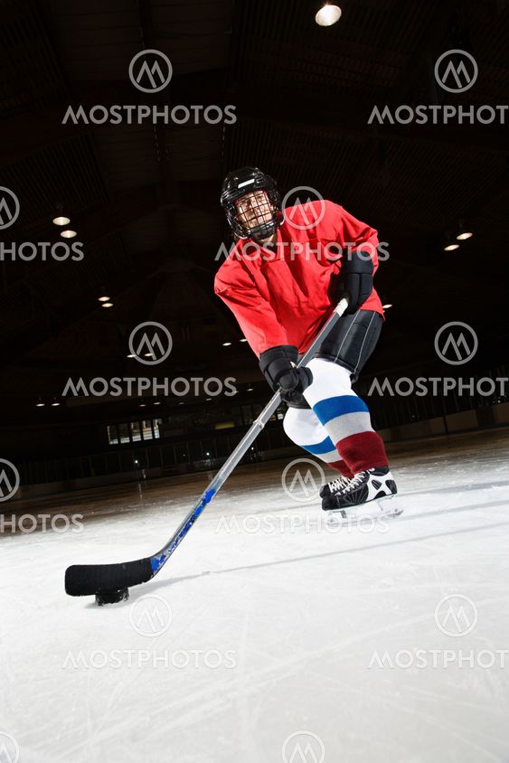 Woman hockey player.