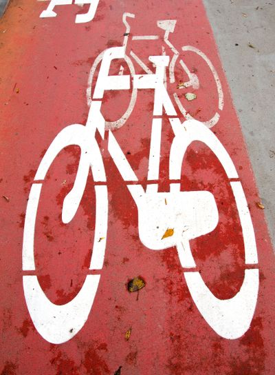 Bicycle path crosses carriageway road section.