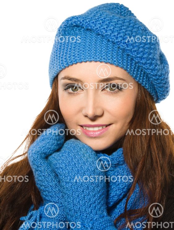 Young happy woman wearing winter cloth