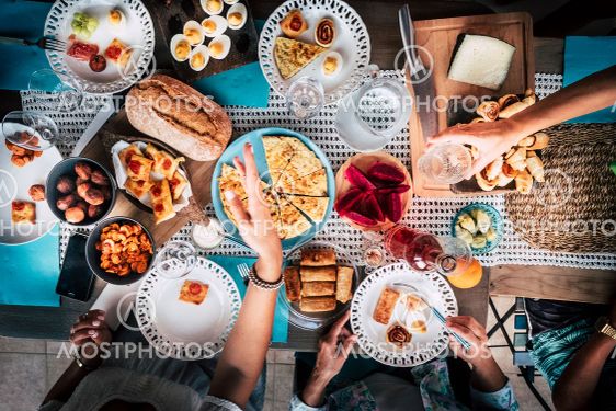 Vertical view of table with blue dishes and lot of...