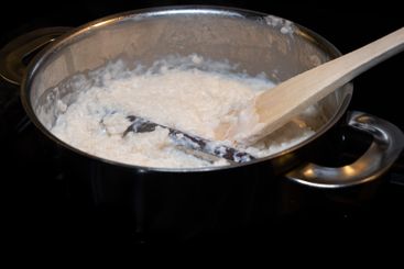 Swedish classic rice pudding with cinnamon stick in a...