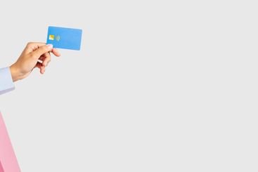 Hand of millennial caucasian lady hold many bags with...