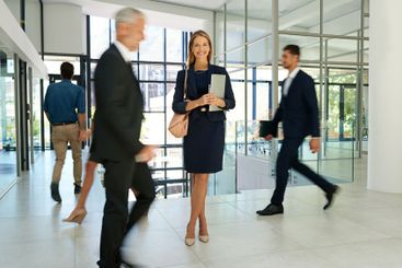 Business people, walking and portrait of woman with...