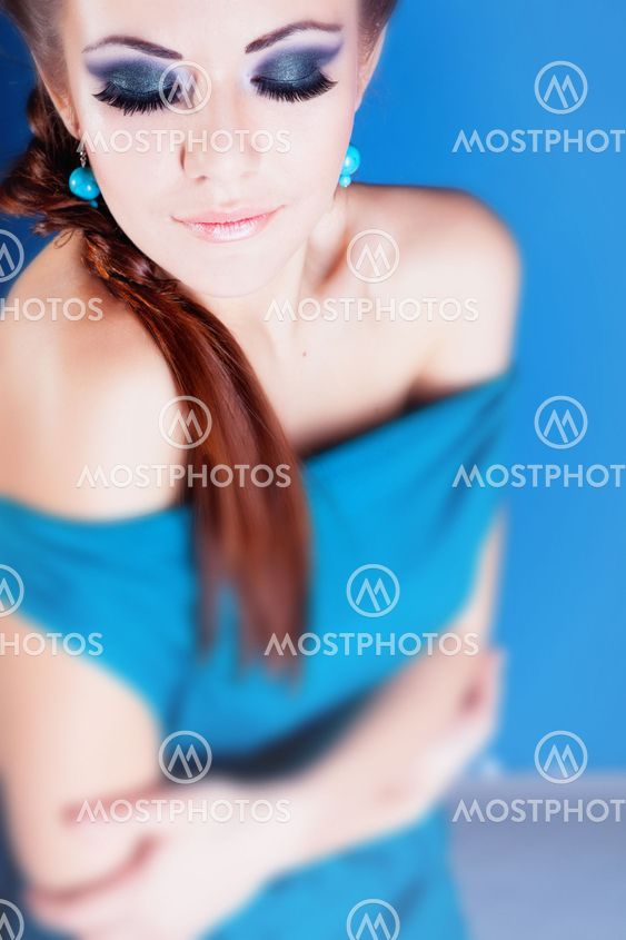 Young beautiful girl in studio