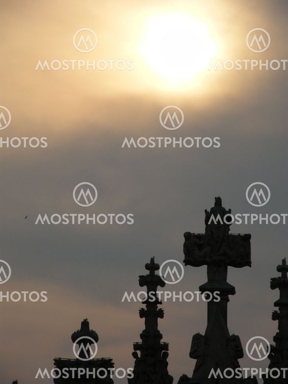 Sinking Sun above Milan Cathedral