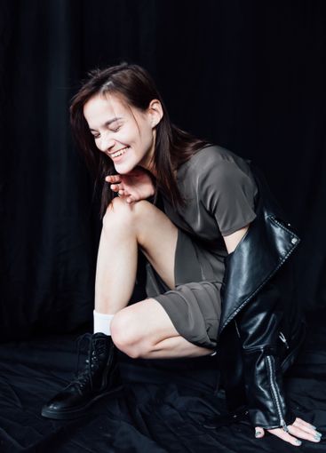 Beautiful fashionable slim woman in green summer and...