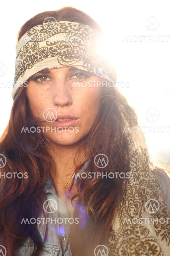 Beautiful Woman on a Field in Summertime