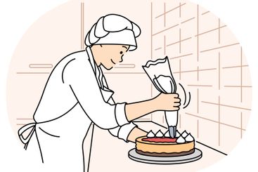 Female chef decorating cake at restaurant