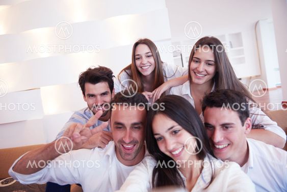 group of friends taking selfie