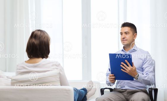 doctor and young woman meeting at home visit