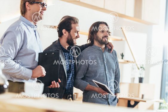businessmen working and talking together
