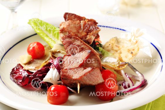 Pork kebab and vegetables