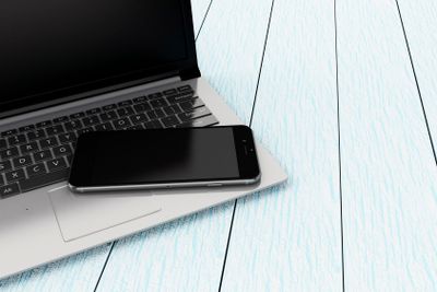 3D Laptop with smartphone.