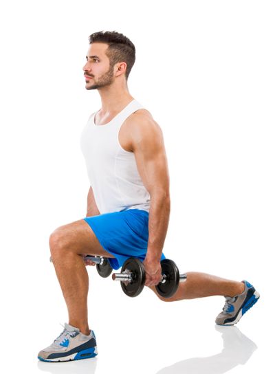 Athletic man lifting weights