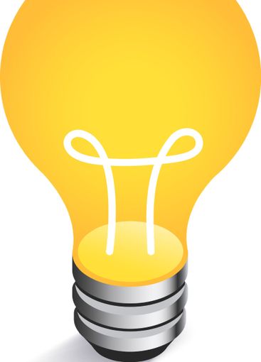 Light bulb glowing with bright yellow light,...