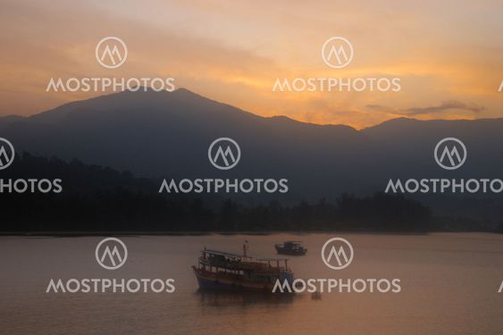 Dawn with a light mist on the sea