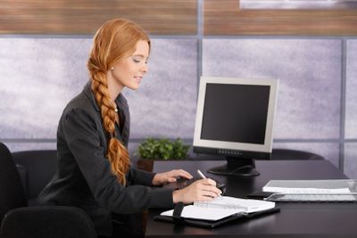 Young businesswoman working at desk�