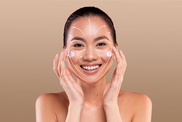 Skincare routine brings joy to woman pampering herself...