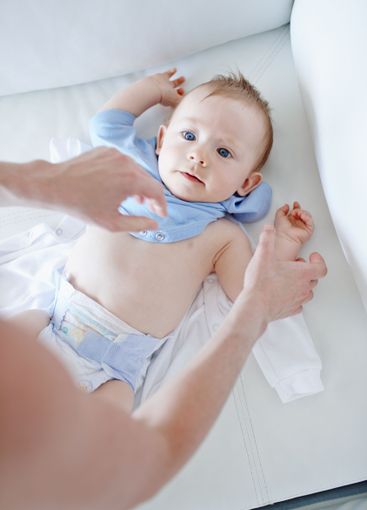 Nursery, hands and parent with baby to change, clothes...