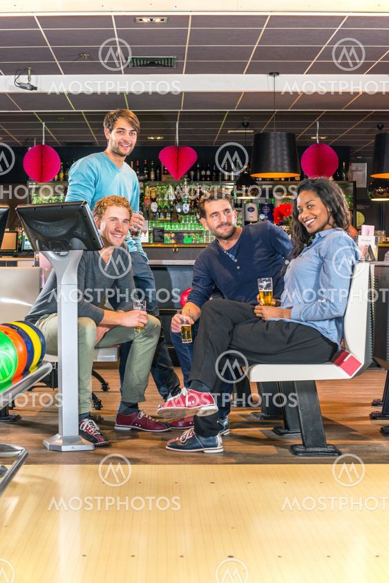 Friends in a bowling alley