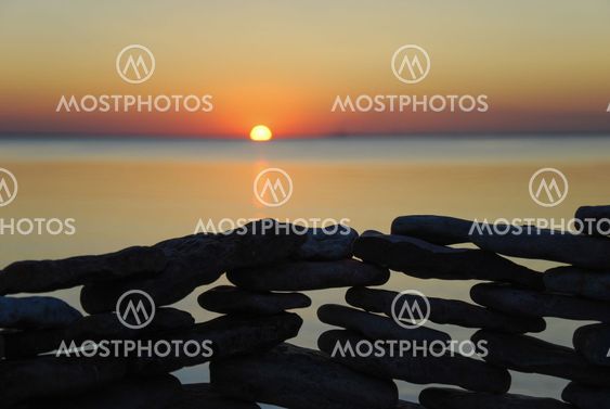Stone wall detail at sunset