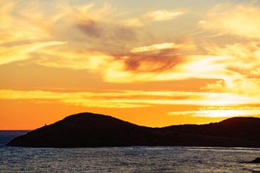 Sunset over sea coast