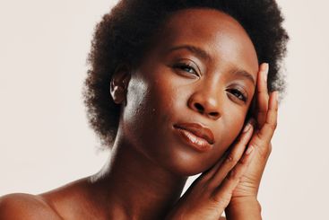 Beauty, skincare and hands with portrait of black woman...
