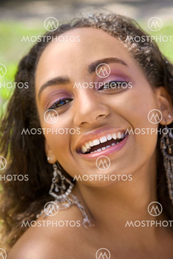Young woman laughing.