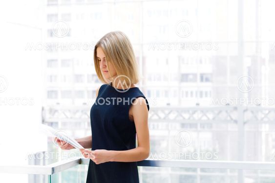 business woman holding reports. Copy space