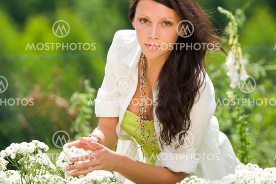 Summer garden beautiful woman care white flowers