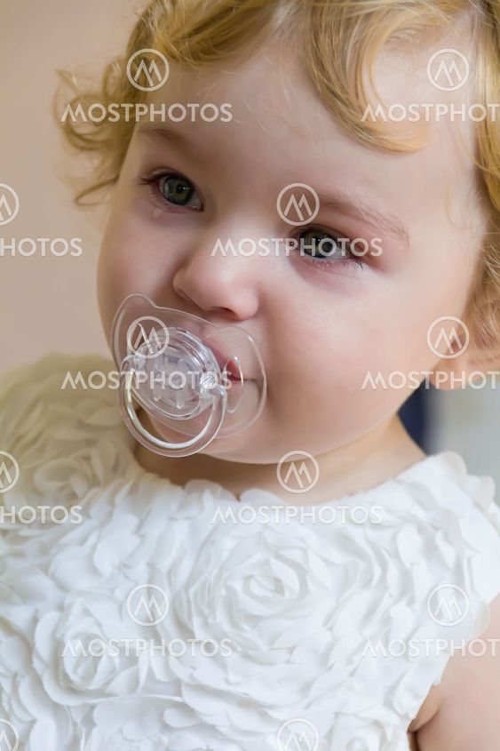 Cute infant with tear