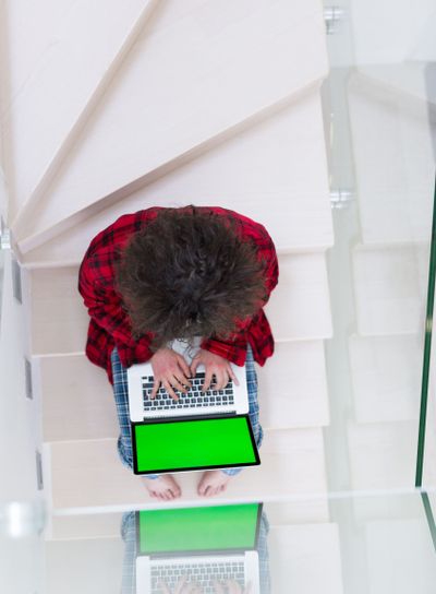 freelancer in bathrobe working from home