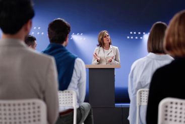 Diverse Business Professional Giving Training Workshop