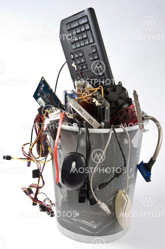 electronic scrap in trash can