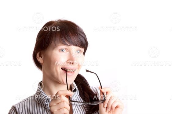 Woman with braces isolated on white