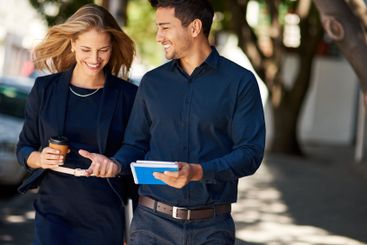 Commute, notebook and walking with business people in...