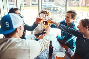 Bar, friends and cheers for fun, beer and party of joy,...