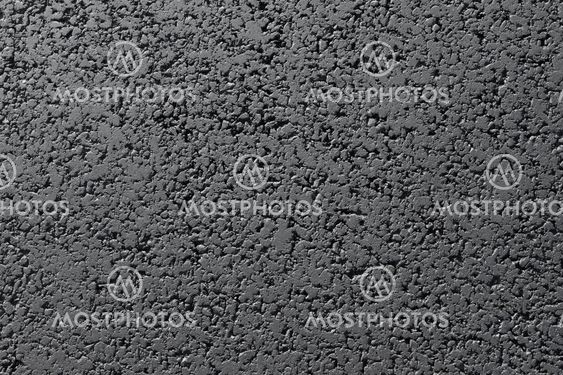 New black asphalt road surface close up abstract texture background.