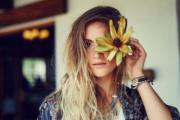 Woman, portrait and flower with natural beauty for...