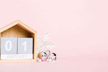 1 january. Christmas composition on colored background...