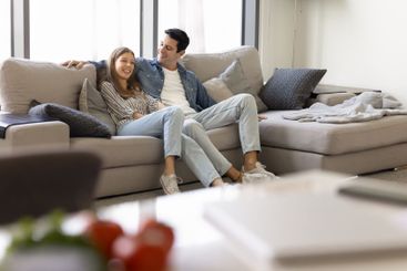 Happy young Latin couple enjoying romantic leisure