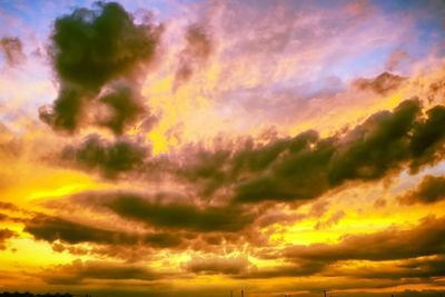 Dramatic sunset like fire in the sky with golden clouds...